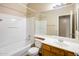 Clean bathroom with a bathtub, toilet and vanity at 4550 E Dublin St, Gilbert, AZ 85295