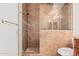 Walk-in shower with tile surround and built-in seat at 5335 E Shea Blvd # 1115, Scottsdale, AZ 85254