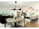 Modern kitchen with white cabinets, concrete table and island at 5444 E Virginia Ave, Phoenix, AZ 85008