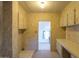 Kitchen with a view into another room at 55215 W La Barranca Dr, Maricopa, AZ 85139