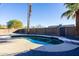 Inviting kidney-shaped pool with diving board in a sunny backyard at 625 E Judi Dr, Casa Grande, AZ 85122