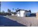 Spacious backyard with gravel landscaping and a partial view of the home at 625 E Judi Dr, Casa Grande, AZ 85122