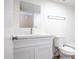 Clean bathroom with white vanity, quartz countertop, and a new toilet at 625 E Judi Dr, Casa Grande, AZ 85122