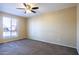 Bright bedroom with carpeted floors and window coverings at 625 E Judi Dr, Casa Grande, AZ 85122