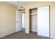 Spacious bedroom with neutral walls, carpet flooring and built-in closet at 625 E Judi Dr, Casa Grande, AZ 85122