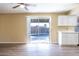 Modern kitchen with white cabinets and backyard view at 625 E Judi Dr, Casa Grande, AZ 85122