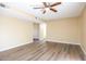 Bright living room with hardwood floors and ceiling fan at 625 E Judi Dr, Casa Grande, AZ 85122