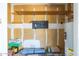Storage room with shelving and water heater at 625 E Judi Dr, Casa Grande, AZ 85122