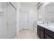 Bathroom features a vanity, shower, and tile floor at 8209 W Lane Ave, Glendale, AZ 85303