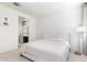 Main bedroom with tufted headboard and ensuite bathroom access at 8209 W Lane Ave, Glendale, AZ 85303