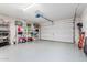 Spacious garage with ample storage shelving and overhead storage at 8209 W Lane Ave, Glendale, AZ 85303