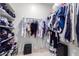 Large walk-in closet with shelving and hanging rods at 8209 W Lane Ave, Glendale, AZ 85303