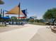 Community water park with slides, shade structures, and play area at 8283 W Mantle Way, Florence, AZ 85132