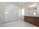 Modern bathroom with walk-in shower and double vanity at 853 W Golden Ore Pass, Apache Junction, AZ 85120