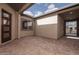 Private courtyard entrance with brick pavers and a tranquil atmosphere at 853 W Golden Ore Pass, Apache Junction, AZ 85120