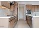 Modern kitchen with an island and ample cabinet space at 853 W Golden Ore Pass, Apache Junction, AZ 85120