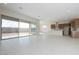 Open living space with large windows and sliding doors to backyard at 853 W Golden Ore Pass, Apache Junction, AZ 85120