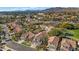 Aerial view of a residential neighborhood with houses and a golf course at 9452 S 51St St, Phoenix, AZ 85044