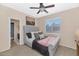 Guest bedroom with a queen bed and en-suite bathroom at 9452 S 51St St, Phoenix, AZ 85044