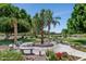 Beautiful community with lush landscaping and a water fountain at 9452 S 51St St, Phoenix, AZ 85044