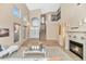 Bright foyer featuring soaring ceilings, a staircase, and large windows that flood the space with natural light at 9452 S 51St St, Phoenix, AZ 85044