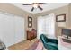 Home office with built-in shelving and plenty of natural light at 9452 S 51St St, Phoenix, AZ 85044