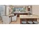 Kitchen boasts granite countertops and modern cabinetry with breakfast nook at 9452 S 51St St, Phoenix, AZ 85044
