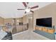 Cozy upstairs loft area complete with ceiling fan, tv, and storage cabinets with stylish baskets at 9452 S 51St St, Phoenix, AZ 85044