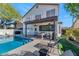 Home features a refreshing pool and a relaxing patio area at 9452 S 51St St, Phoenix, AZ 85044