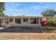 Ranch style home with covered patio and spacious backyard at 10288 W Snead N Cir, Sun City, AZ 85351