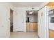 View of kitchen, showing a pass-through to another room at 10288 W Snead N Cir, Sun City, AZ 85351