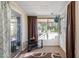 Sunroom with ample natural light and seating area at 10288 W Snead N Cir, Sun City, AZ 85351