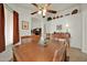 Cozy dining area with wooden table and chairs, near the kitchen at 10642 W Mohawk Ln, Peoria, AZ 85382