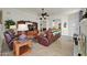 Bright living room featuring tiled floors and ample seating at 10642 W Mohawk Ln, Peoria, AZ 85382