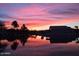 Stunning sunset view over calm lake water, reflecting the colorful sky at 10642 W Mohawk Ln, Peoria, AZ 85382