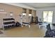 Modern weight room with free weights, weight machines, and exercise balls at 10642 W Mohawk Ln, Peoria, AZ 85382