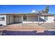 Covered patio area in the backyard of the home at 11451 E Broadway Rd, Mesa, AZ 85208