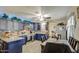 Spacious kitchen featuring granite countertops and dark blue cabinetry at 11451 E Broadway Rd, Mesa, AZ 85208