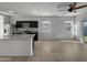 Modern kitchen with granite countertops and dark cabinetry at 11468 E Sunflower Ln, Florence, AZ 85132