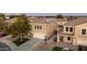 Two-story house with solar panels and attached garage, viewed from above at 11935 N 148Th Ave, Surprise, AZ 85379