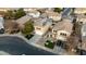 Aerial view of a two-story house with solar panels and a swimming pool at 11935 N 148Th Ave, Surprise, AZ 85379