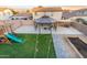 Spacious backyard with gazebo, playground, and artificial turf at 11935 N 148Th Ave, Surprise, AZ 85379