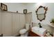 Stylish powder room with unique vanity and mirror at 11935 N 148Th Ave, Surprise, AZ 85379