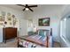 Spacious bedroom with ample natural light and a ceiling fan at 11935 N 148Th Ave, Surprise, AZ 85379