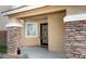 Covered entryway with stone pillars and a decorative door at 11935 N 148Th Ave, Surprise, AZ 85379