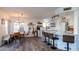 Bright kitchen with island, white cabinets, and wood-look floors at 11935 N 148Th Ave, Surprise, AZ 85379