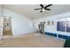 Versatile playroom with built-in seating, a ceiling fan, and lots of natural light at 11935 N 148Th Ave, Surprise, AZ 85379