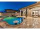 Inviting pool and spa with a spacious patio at 12007 W Creosote Dr, Peoria, AZ 85383