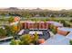 Aerial view of a condo complex with mountain views and surrounding landscape at 12212 N Paradise Village S Pkwy # 134, Phoenix, AZ 85032