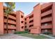 Exterior view of a two-story condo building with landscaping at 12212 N Paradise Village S Pkwy # 134, Phoenix, AZ 85032